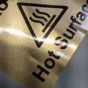 Caution Hot Surface Sign, Adhesive, Sticker, Notice - engraved with Universal Icon Symbol and Text (Size 12cm x 10cm) (Gold)