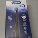 Oral-B Rechargeable Electric Toothbrush, iO2 Starter Kit, 3 Cleaning Modes, Automatic Pressure Sensor to Protect Gums, 2 Brush Heads, Night Black