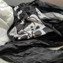 JOYIN 8.5ft Halloween Inflatable Skeleton, Blow Up Skeleton Holding Pumpkin for Rooftop Outdoor Decoration with LED Light, Blow Up Skeleton Sitting On The Roof for Halloween Rooftop Yard Party Decor