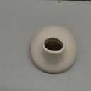 Off-white ceramic candle holder