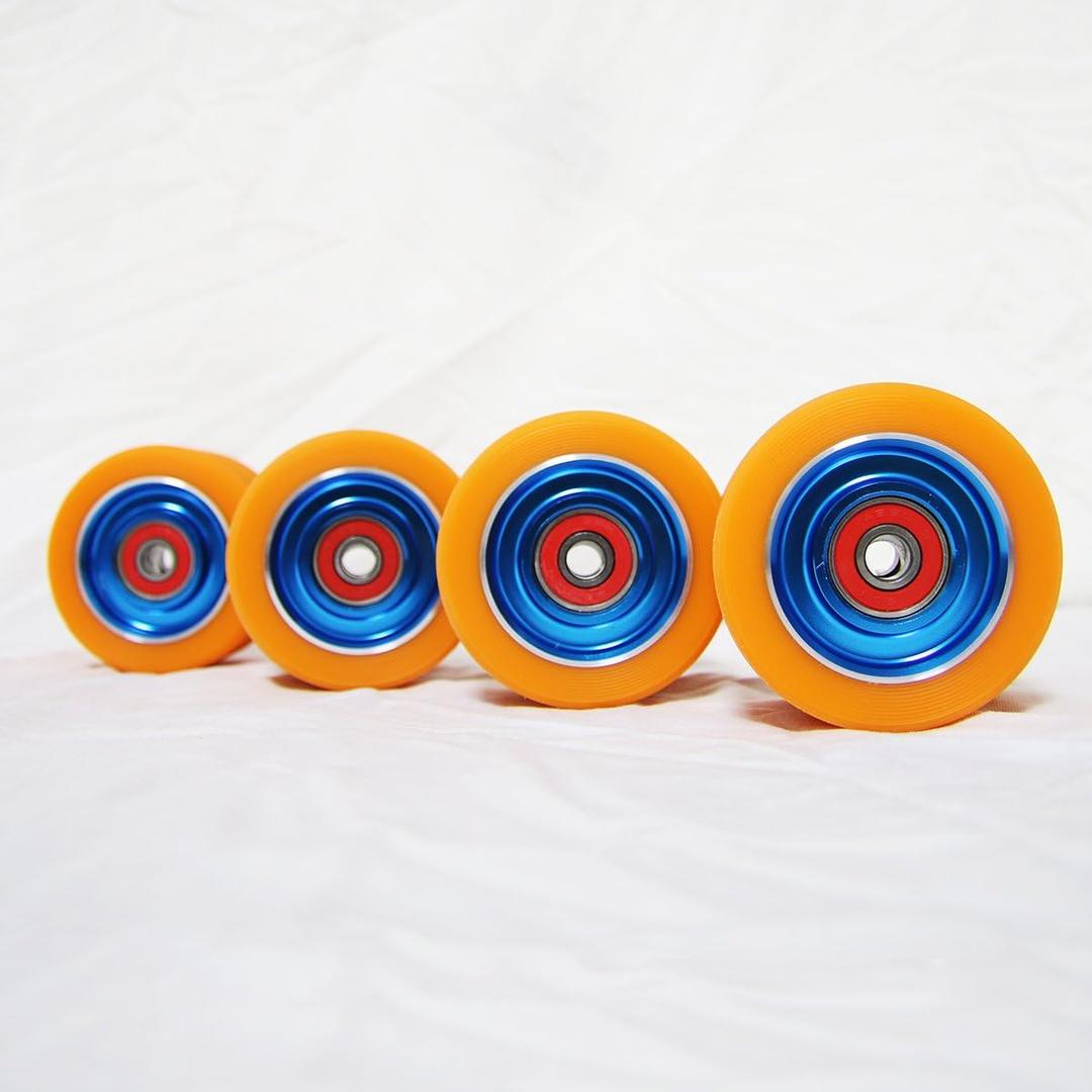 62mm Roller Skates Wheels Aluminum Alloy Speed Skate Wheels Replacement Wheels with Abec-9 Bearing (Pack of 4) (Orange-Blue)