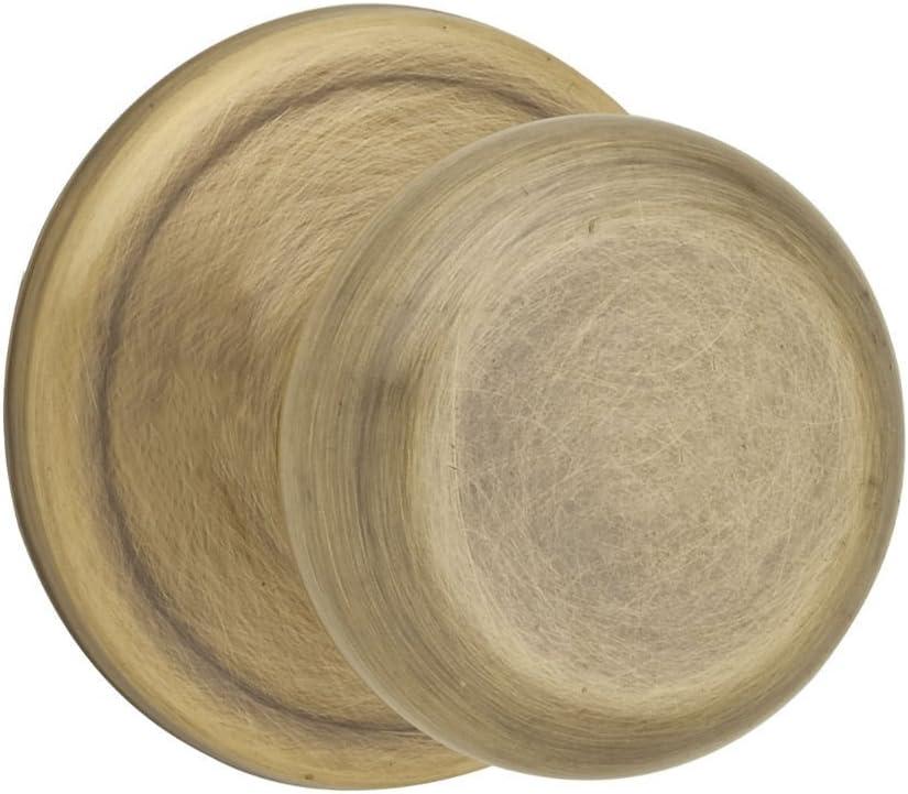 Kwikset Juno Interior Passage Door Knob, Handle For Closet and Hallway Doors, Non-Locking Doorknob in Antique Brass, with Microban Protection (1 Pack)