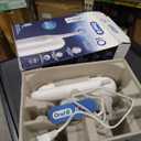Oral-B Rechargeable Electric Toothbrush, iO2, 3 Cleaning Modes, Automatic Pressure Sensor to Protect Gums, Pure White