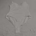 Irisnaya Women's Plunge Deep V Neck Bodysuits with Built in Bra Sleeveless Double Lined Body Suits Tops (X-Large, White)