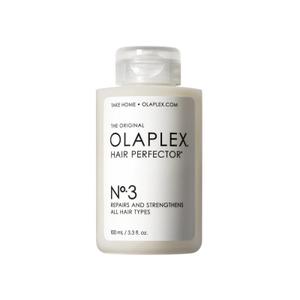 Olaplex No. 3 Hair Perfector Repairing Hair Treatment. Davines MoMo Conditioner. Quenching + Coconut Curls Curl-Defining Shampoo