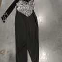CUTUBLY Women Club Wear Feather Bodycon Jumpsuits Summer Sexy Rhinestone Jumpsuits Birthday Event Party Club Night Outfits (Small, Black-zy6079)