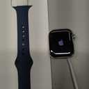 Apple Watch Series 9 [GPS + Cellular 41mm] Smartwatch with Silver Stainless Steel Case with Storm Blue Sport Band S/M. Fitness Tracker, Blood Oxygen & ECG Apps, Always-On Retina Display