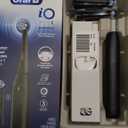 Oral-B Rechargeable Electric Toothbrush, iO2 Starter Kit, 3 Cleaning Modes, Automatic Pressure Sensor to Protect Gums, 2 Brush Heads, Night Black