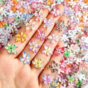 50Pcs Flower Nail Charms for Nail Design Spring Summer Hibiscus Floral Nail Rhinestones Flat Back Hawaii Flower Nail Charms and Gems Mixed Color Lily Nail Jewelry for Women Girls Manicure Decor, Medium