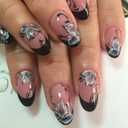 Spring Press on Nails Short Oval Fake Nails with Flower Designs Black French Tip Nails Press ons Glossy Glue on Nails Summer Acrylic Nails Nude Artificial Stick on Nails for Women 24Pcs