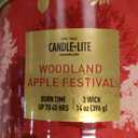 Candle-lite 14 oz jar candle features a Woodland Apple Festival scent.