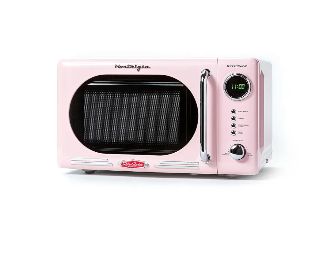 Nostalgia Retro Compact Countertop Microwave Oven 0.7 Cu. Ft. -700-Watts with LED Digital Display-Child Lock-Easy Clean Interior-Pink