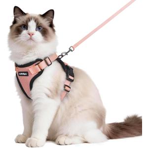 rabbitgoo Cat Harness and Leash for Walking, Escape Proof Soft Adjustable Vest Harnesses for Cats, Easy Control Breathable Reflective Strips Jacket, Light Salmon Pink, M
