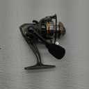 Lews Laser Lite Spinning Fishing Reel, 6+1 Bearings, Graphite Frame and Sideplate, Speed Lube, Multi-Disc Drag, Metallic Gray/Silver/Gold (50)