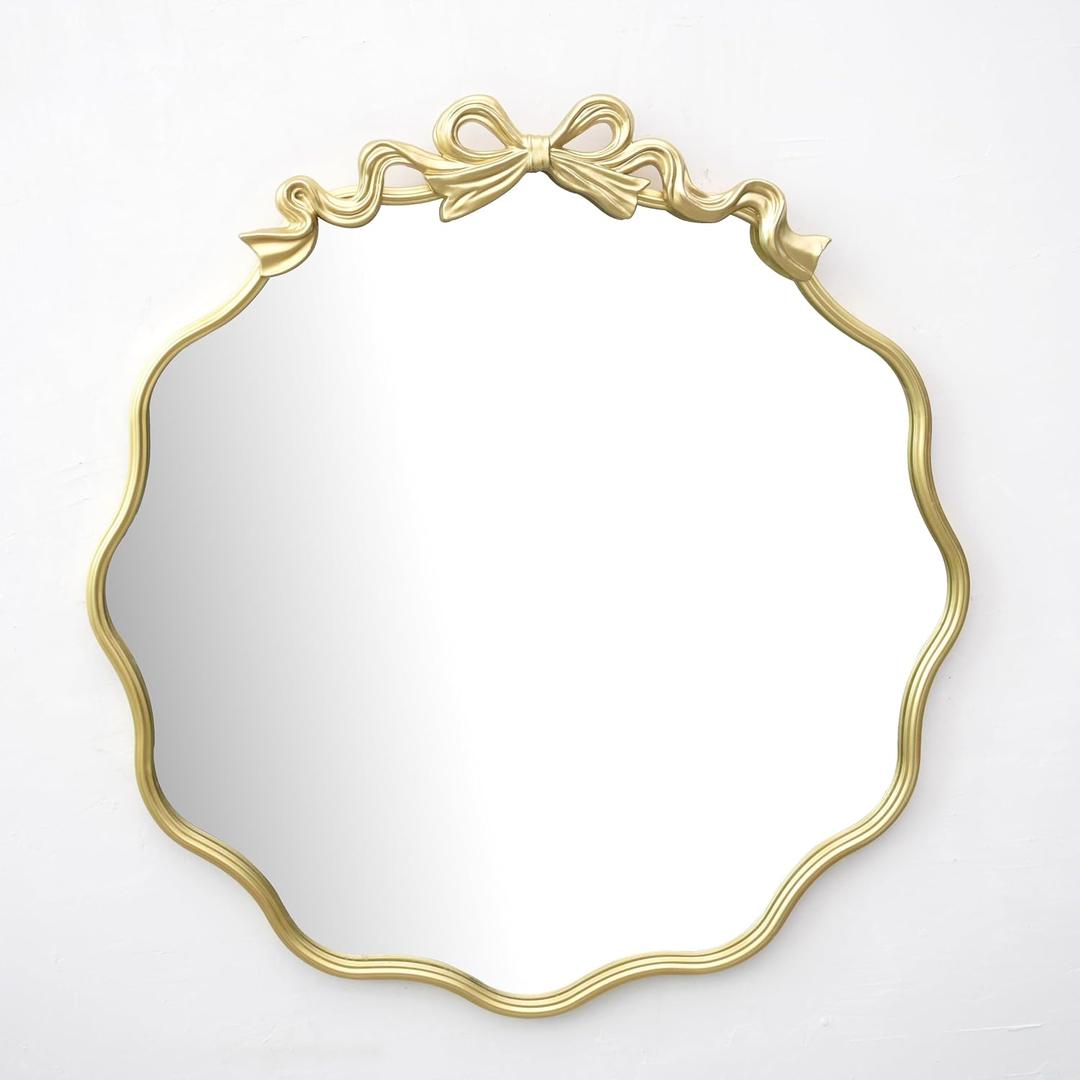 25.75Inch Decorative Gold Bow Metal Wall Mirror - Elegant Wavy Edge Accent Mirror for Bedroom, Bathroom, Entryway & Living Room Home Decor