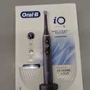 Oral-B iO Deep Clean + Protect Rechargeable Electric Toothbrush, Black with a iO Series 7 Toothbrush, 2 Replacement Brush Heads, and a Charging Travel Case