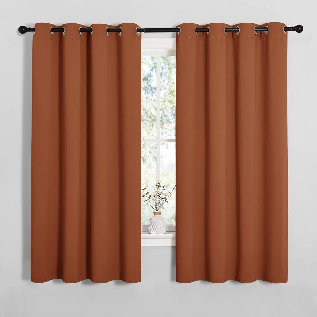 NICETOWN Blackout Curtain Panels for Girls Room, Nursery Essential Thermal Insulated Solid Grommet Top Blackout Drapes (Burnt Orange, 1 Pair, 55 x 68 inches)