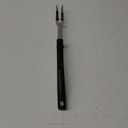 Stainless Steel Grilling Or BBQ Fork With A Black Handle