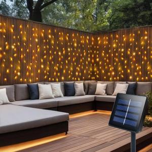 DBFAIRY Solar Curtain Lights,13ft x 3.3ft 200 LED Outdoor Solar Curtain Lights Waterproof Green Wire with 8 Mode for Garden Handrail Railing Eaves Wall Decoration -Warm White