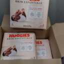 Huggies Size 1 Diapers, Skin Essentials Baby Diapers, Size 1 (8-14 lbs), 198 Count (3 Packs of 66)