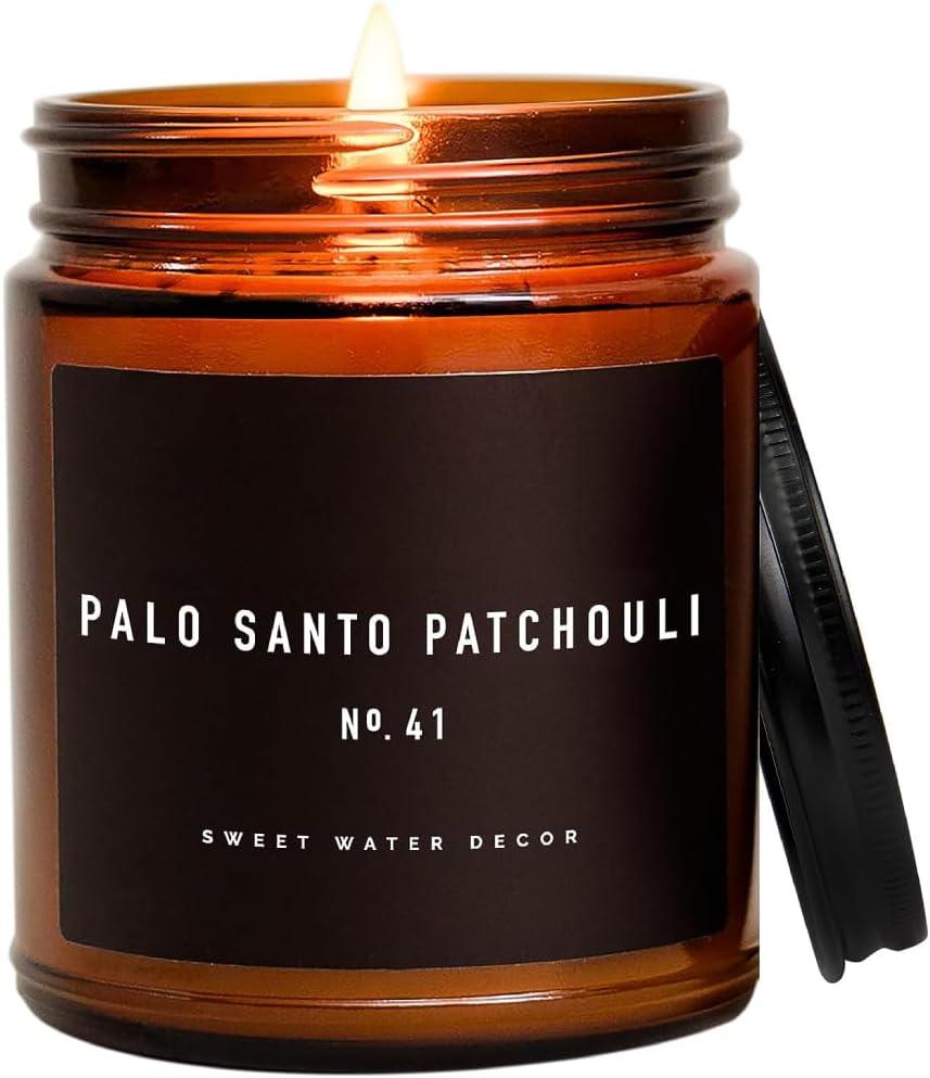 Sweet Water Decor Palo Santo Patchouli Candle - Vanilla, Musk, Sandalwood, Patchouli Scented Soy Spa Candles for Home - Gifts for Women, Men - 9oz Amber Jar, 40 Hour Burn Time (Black Label)