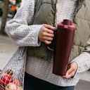 Owala FreeSip Tumbler Insulated Stainless Steel Water Bottle with Built-in Straw and Side Handle, For Travel, Work, School, and Sports, 40oz, BPA Free, Leak Proof, Black Cherry