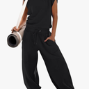 LAMISSCHE Womens Oversized Wide Leg Jumpsuit with Pockets Elastic Waist Workout Onesie Romper Open Back Outfits, S