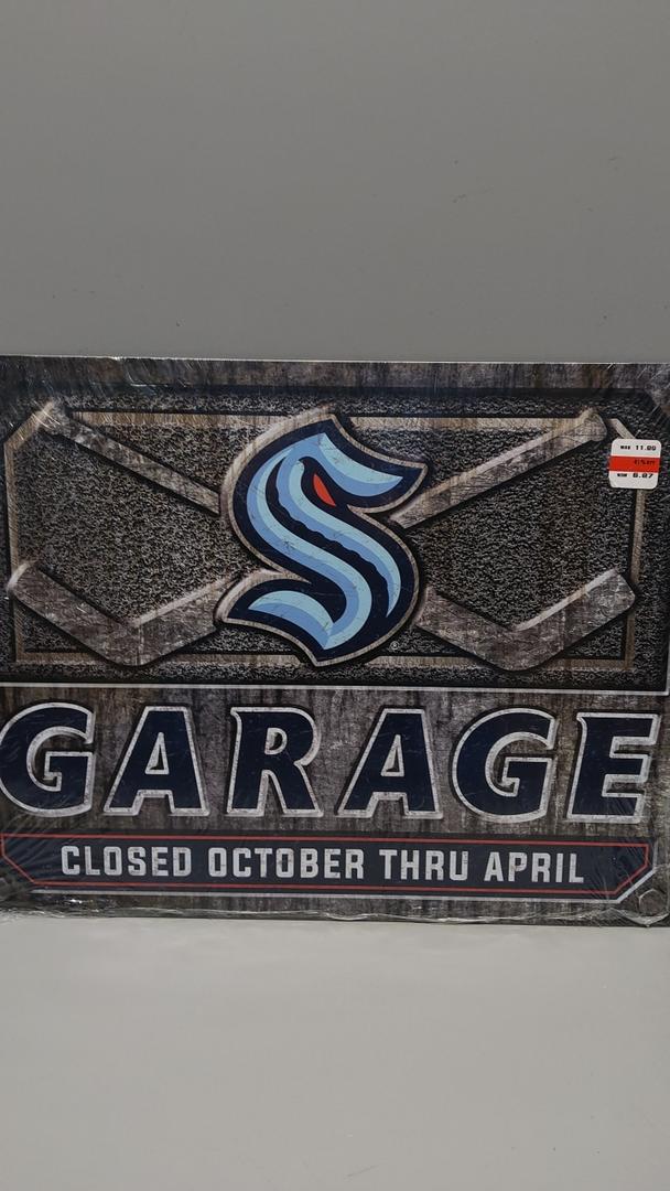 garage closed October thru April sign