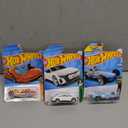 Hot Wheels 2023 Surf's Up Series #4/5 Deora III #HKK81 1:64 Scale Die-cast, Hot Wheels Audi RS E-Tron GT White #36 Mainline 2024, 2024 Hot Wheels 75/250 Hot Wheels Rockin' Railer HW Race Day 2/10, Pack of 3