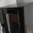GE GCST14S1WBB 1.4 Cu. Ft. Black Countertop Microwave (Door stock can't open)