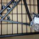 Foldable Grid Wall, Easy to Install Without Tools, Suitable for Supplier Retail, Art and Craft Display Scenarios. A Metal Grid Display Stand with Wheels and 20 Hooks, Measuring 6 Feet x 2 Feet.