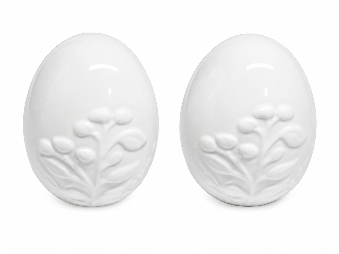 2 White Ceramic Eggs With Embossed Flowers