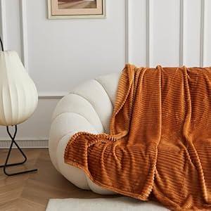 Simple&Opulence Flannel Fleece Luxury Super Soft Decorative Throw Blanket, Lightweight Horizontal Blanket for Couch Bed Sofa (Rust, 50" x 70")
