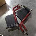 Medline Lightweight Foldable Transport Wheelchair with Handbrakes and 12-Inch Wheels, Red Frame, Black Upholstery