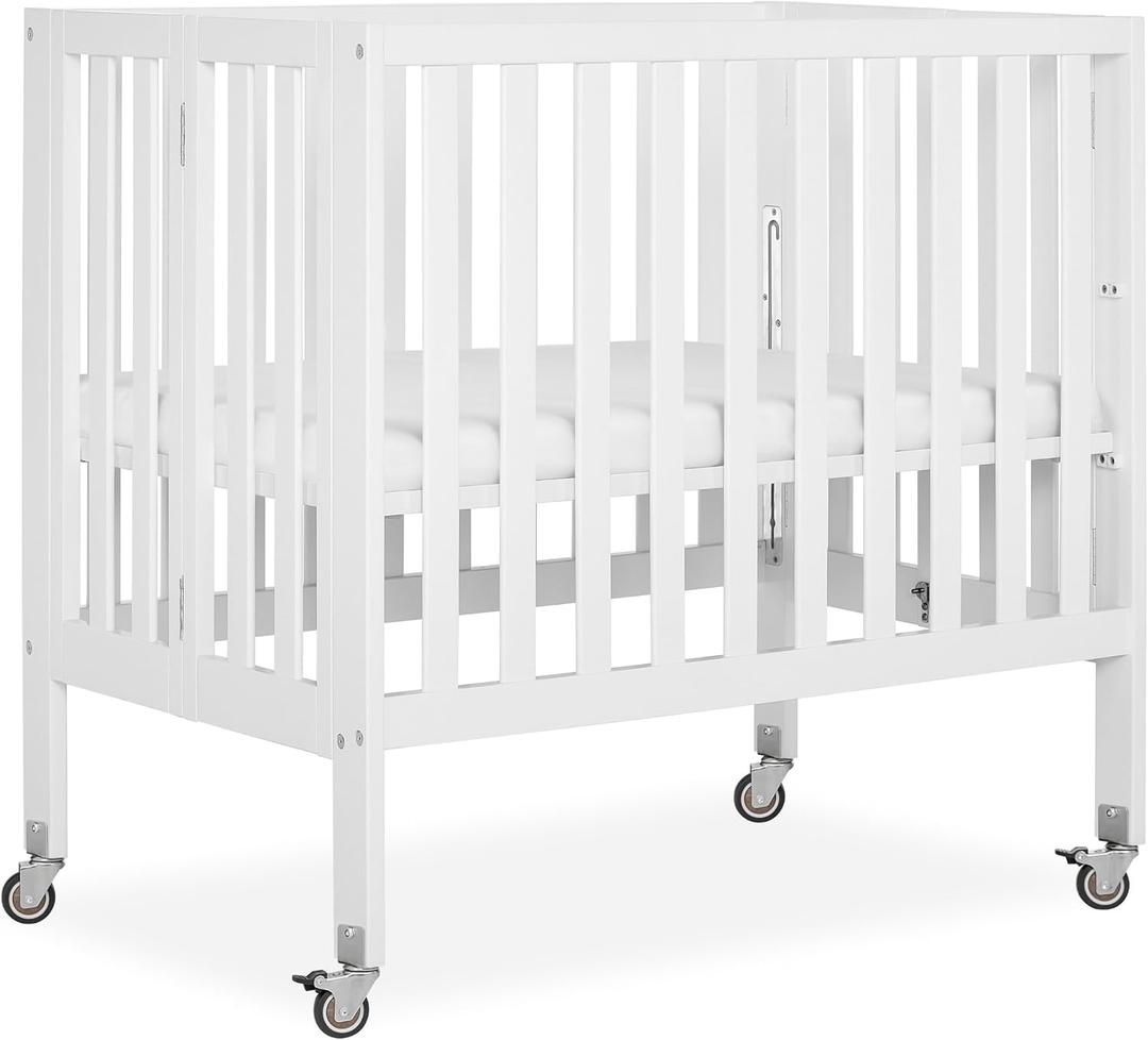 Dream On Me Jett Mini Folding Baby Crib in White, GreenGuard Gold & BSA, Lightweight & Portable, Patented Flat Folding System for Small Spaces & Travel, 1.5” Mattress Pad, 3 Heights, Safe Wheels, 38"L x 26"W x 36"H