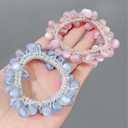 The pink beaded bracelet that doubles as a hair tie Small Youth