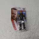 WWE Undertaker Action Figure, Posable 6-in Collectible for Ages 6 Years Old & Up
