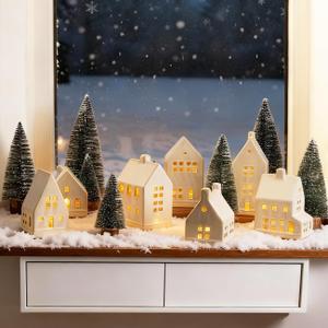 Christmas Village Set - 7 White Ceramic Houses with Remote LED Tea Lights and 8 Mini Trees, Farmhouse Christmas Decorations Indoor for Fireplace, Mantel, Tabletop, Shelves Winter Holiday Decor
