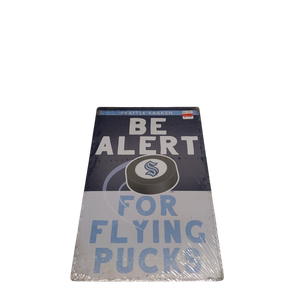 Seattle kraken be alert for pucks metal sign