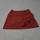 ODODOS Women's Athletic Tennis Skorts with Pockets Built-in Shorts Golf Active Skirts for Sports Running Gym Training, S, Carmine Red