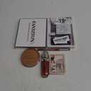 1.,FANXITON Eyeshadow Palette 2. False Eyelash Tray 3. Rimmel Natural Bronzer 4.KIKO Milano Lip Gloss / Liquid Lipstick 5. Revlon Colorstay Lip Liner 6. Maybelline Eye Enhancer Palette 