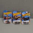 Pack Of 3 Hot Wheels Cars (HW-4-Trac, Head Gasket, Fast Felion)