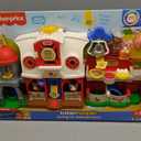 Fisher-Price Little People Caring for Animals Farm Electronic Interactive playset with Smart Stages Learning Songs for Toddlers Ages 1 and up