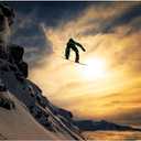 Wrapped Canvas Wall Art - Jakob Sanne 'Sunset Snowboarding' Wall Art for Living Room, Bedroom, or Office Décor - 22x32