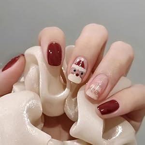 LBPEPAMZ Christmas Press on Nails Short Square Fake Nails with Cute Santa Claus Designs Gold White Glitter Xmas Tree Acrylic Stick on Nails Red Full Cover Glossy Glue on Nails for Women Girls 24Pcs
