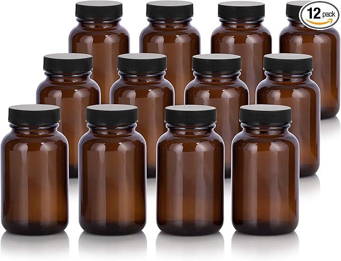 JUVITUS Amber 4 oz Glass Packer Bottle with Black Ribbed Lid (12 pack)
