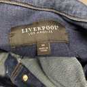 Amazon Essentials Women's Regular-Fit Low Stretch Denim Trucker Jacket with Pockets Medium