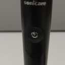 Philips Sonicare 4100 Series Electric Toothbrush - Sonic Toothbrush with Advanced Sonic Technology, Pressure Sensor, Two Intensity Settings, Smartimer & Quadpacer, Black, Model HX3681/24