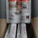 Huggies Size Newborn Diapers, Skin Essentials Baby Diapers, Size Newborn (6-9 lbs), 180 Count (3 Packs of 60)
