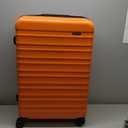 Amazon Basics 30" Hard side Large Checked Luggage, Expandable For Up to 15% More Space, Hard shell Suitcase With Wheels, Scratch-Resistant Surface, Four Multi-directional Wheels, Orange